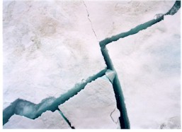 Pack ice cracks as the Icebreaker grinds through