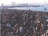 Devotees line up at the Prayag